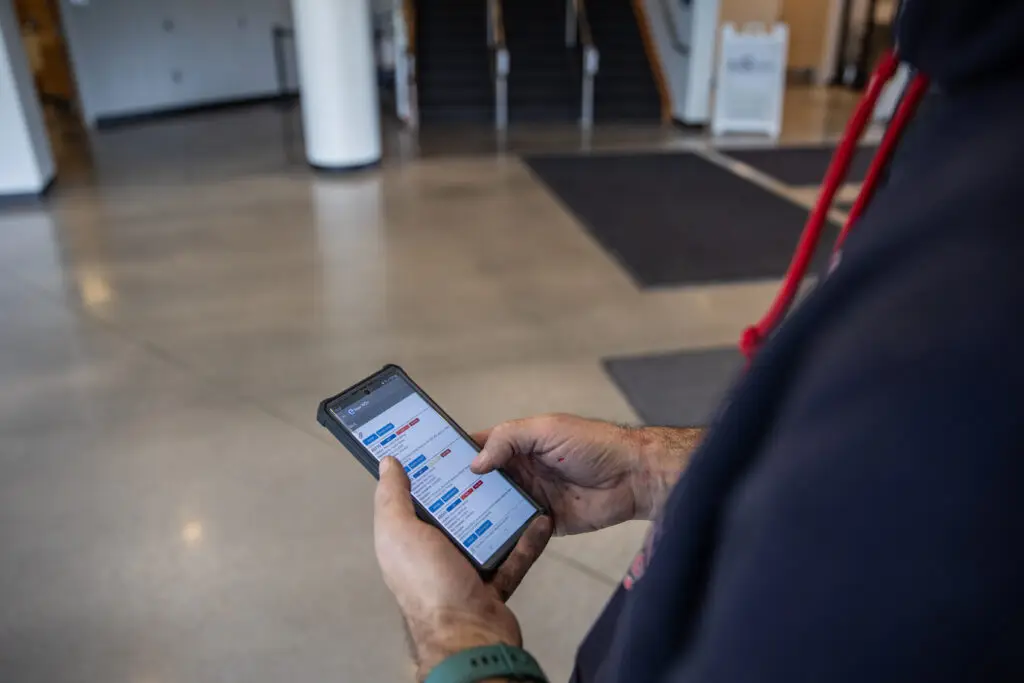 image of Espace's work order management tool on an iphone