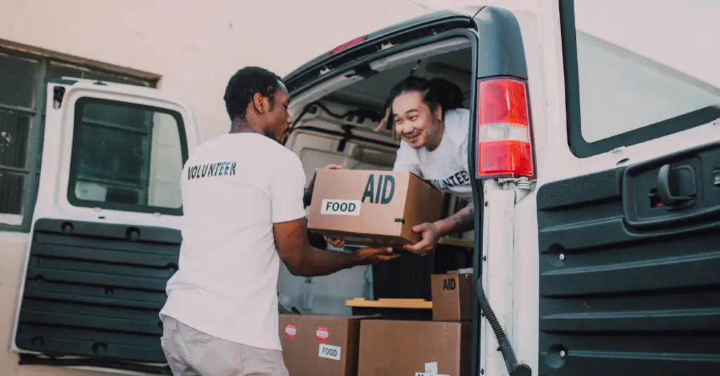 canva stock image of two men delivering food
